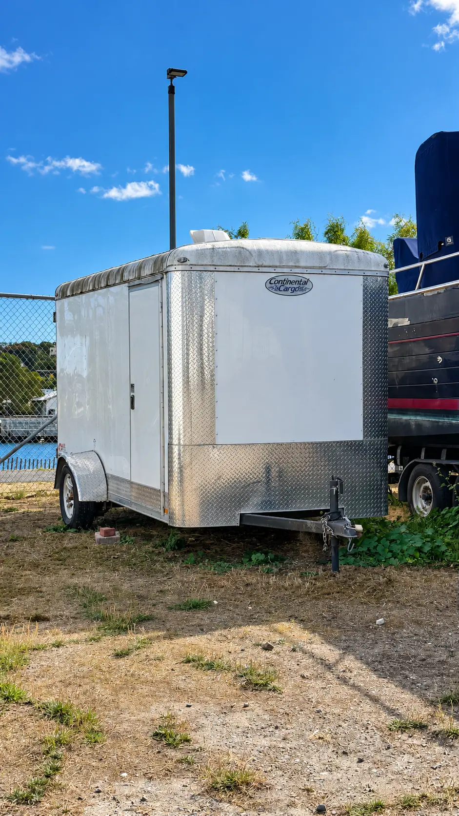 Enclosed cargo trailer parked in a trailer storage space at Marinship Industries Storage, Sausalito