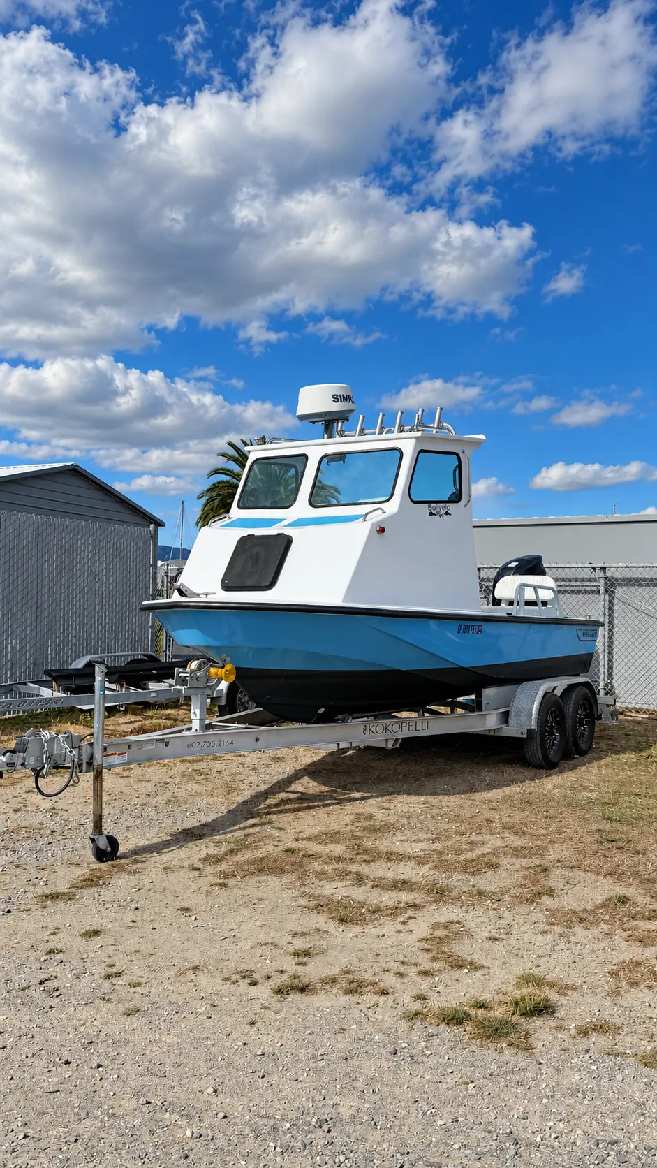 Boat on its trailer in a dry boat storage space at Marinship Industries Storage, Sausalito
