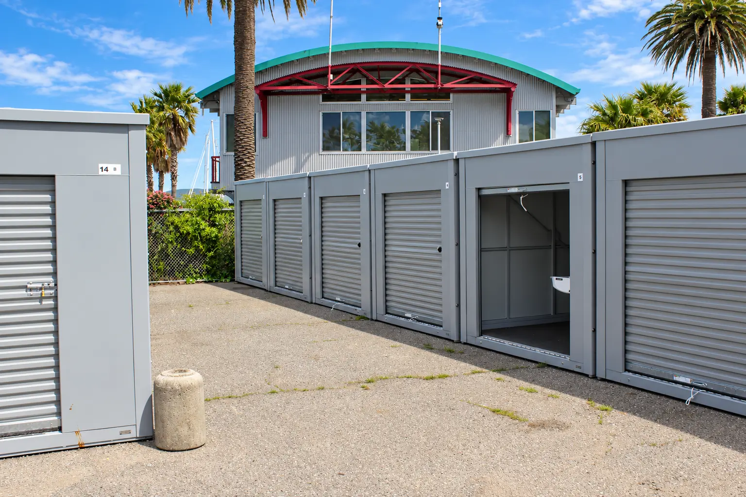 Row of roll-up storage units at Marinship Industries Storage in Sausalito